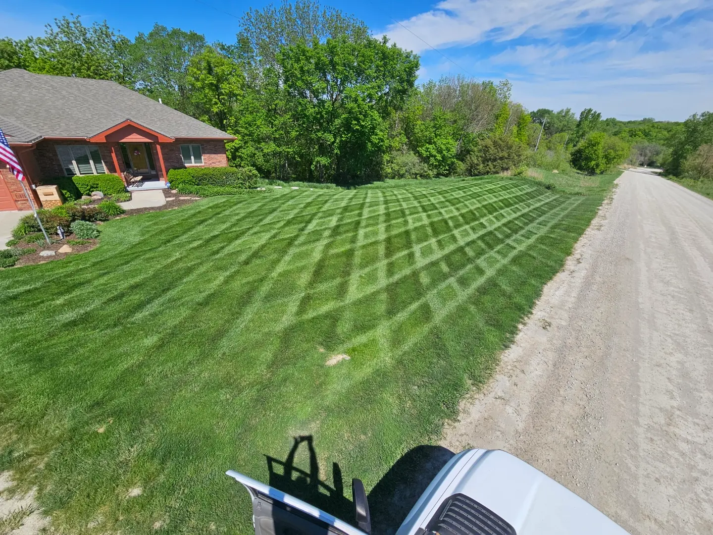 Lawn care work by Buthe's Turf